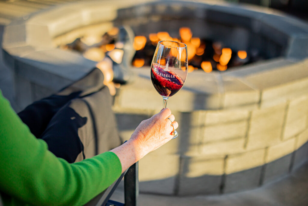 Wine in front of firepit at Kriselle Cellars